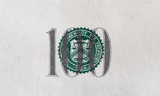 istock fragment of old 100 dollar bill 1185416282