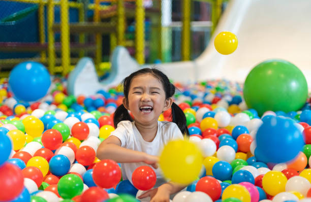 istock Cute girl at the Ball Pool 1185417268
