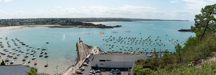 Erquy, Cotes-d-Armor / France - 20 August, 2019: panorama view from above of the old port and harbor of Erquy in Brittany