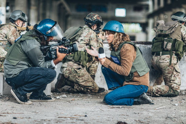 istock War journalists in the war zone 1185422288