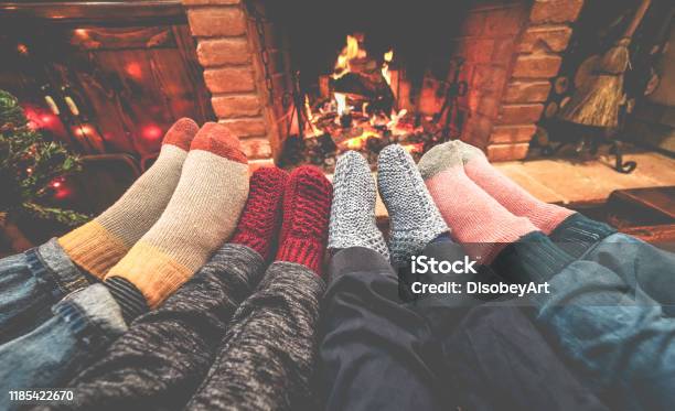 Legs View Of Happy Family Wearing Warm Socks In Front Of Fireplace Winter  Love And Cozy Concept Focus On Center Grey Woolen Socks Stock Photo -  Download Image Now - iStock