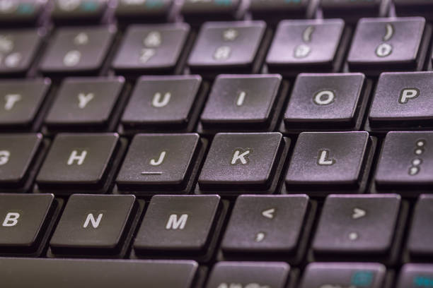 istock Black laptop keyboard close up 1185423244