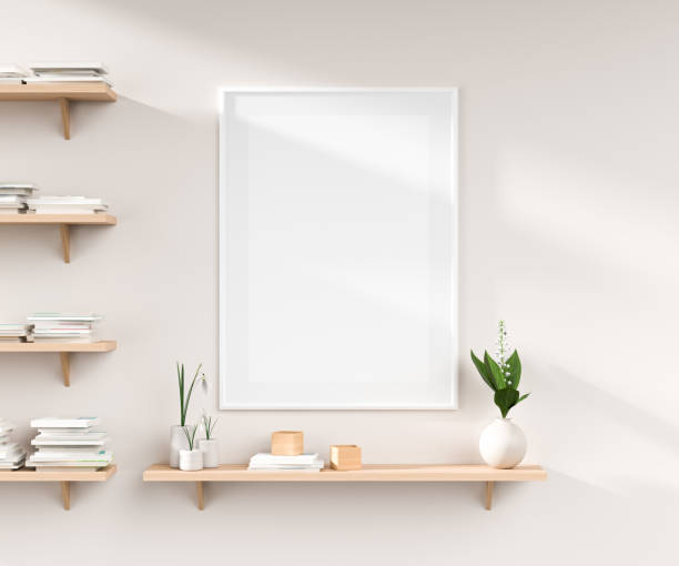 istock Mock up poster frame on white wall with wooden rack. 3D illustration 1185424601
