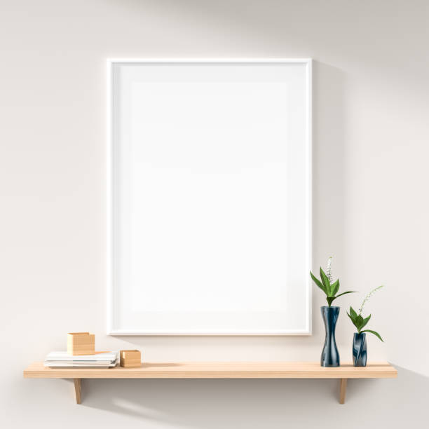 istock Mock up poster frame on white wall with wooden rack. 3D illustration 1185424658