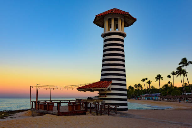 istock caribbean sea sunrise lighthouse 1185426463