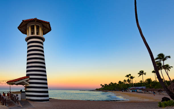 istock caribbean sea sunrise lighthouse 1185426517