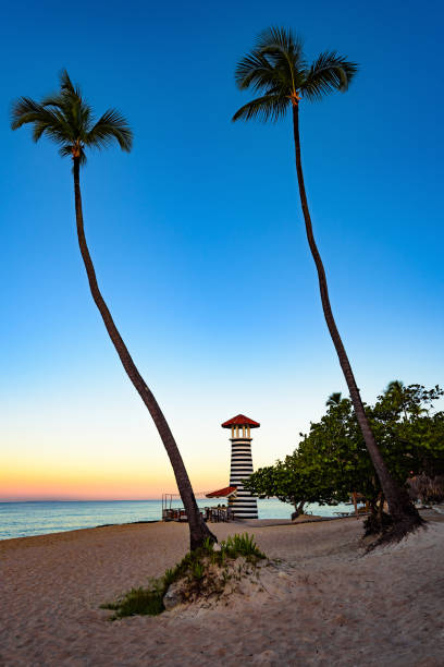 istock caribbean sea sunrise lighthouse 1185427147
