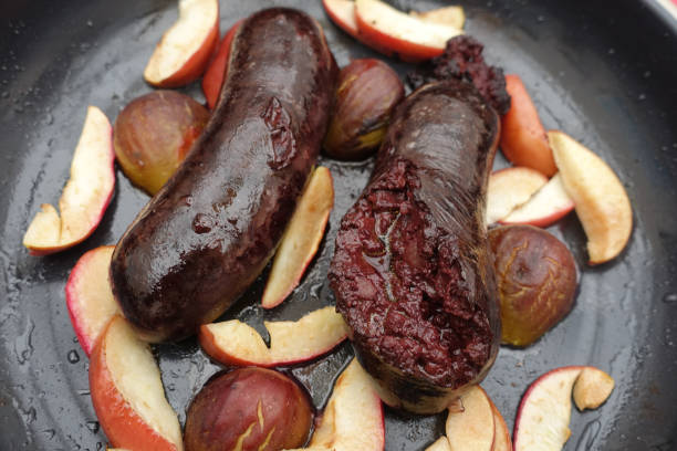 istock Black pudding with onions served with apples and hash browns 1185427240