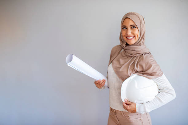 istock Pretty arabic architect woman isolated shot in studio 1185428859