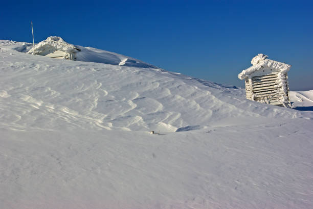 istock Snow covered weather station on mountain top 1185429037