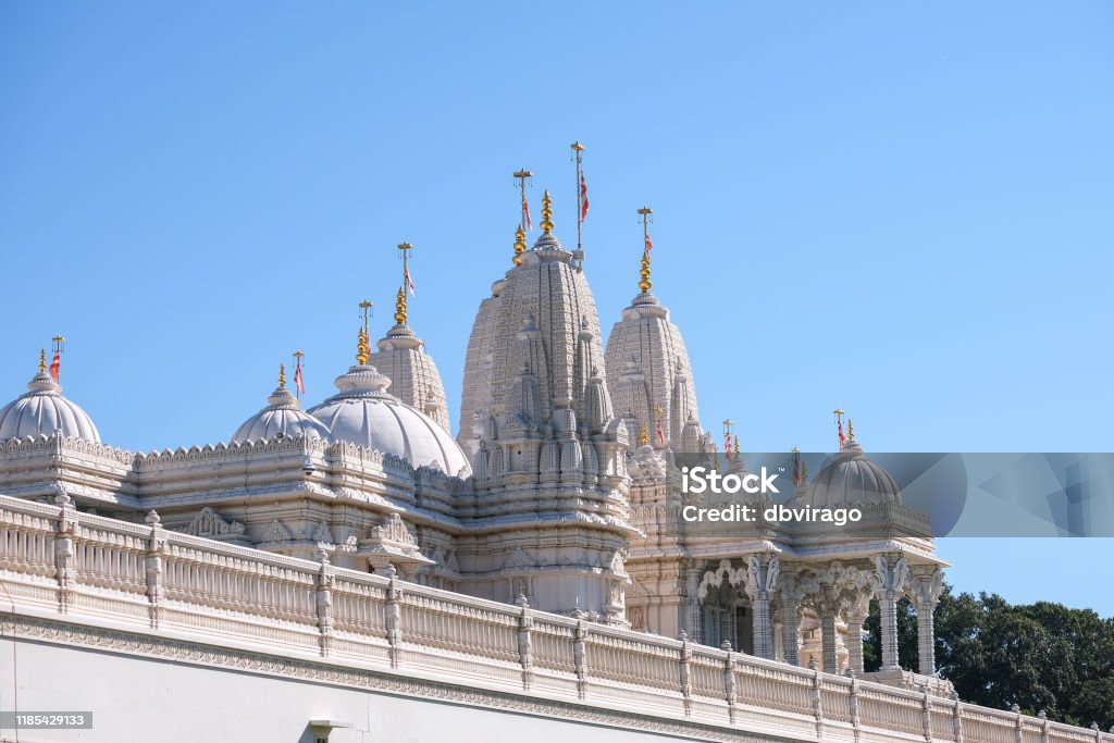 Balustrades and Domes on Hindu Temple View of a white marble hindu temple Architecture Stock Photo
