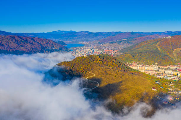istock Fog comming over mountain city 1185429395