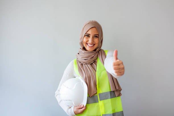 Muslim woman with personal protective equipment.