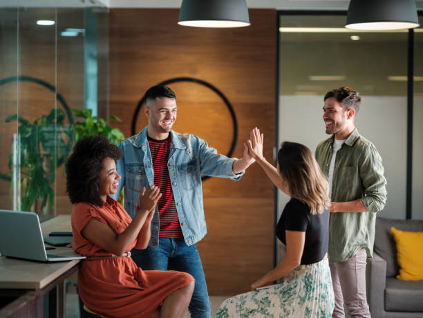 istock Happy young people celebrating together 1185430895