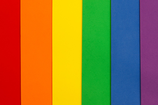 Abstract background created with foam board in the LGBT pride rainbow colors of red, orange, yellow, green, blue and purple.