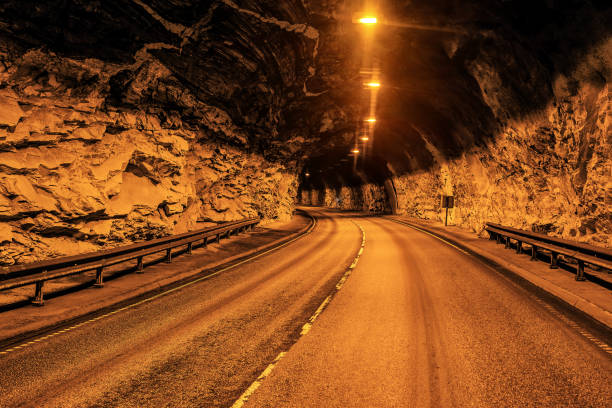 istock car tunnel in mountain 1185438299