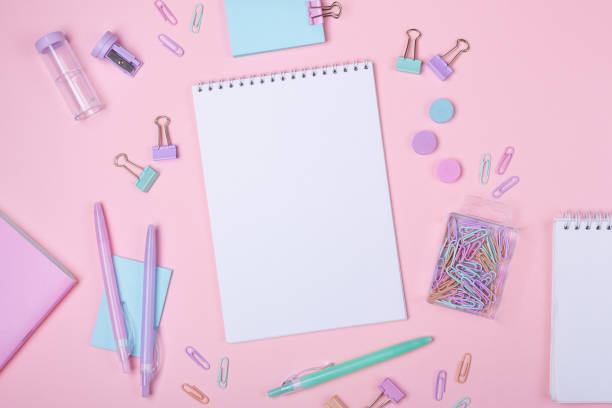 istock School background with notebooks and pastel colorful study accessories on pink background Back to school concept 1185439213