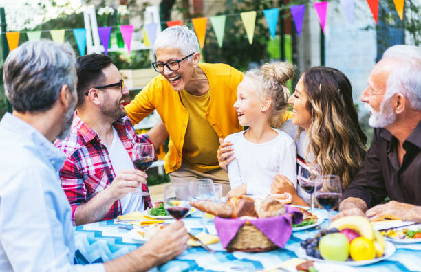 istock Happy family celebrating Thanksgiving day 1185440037