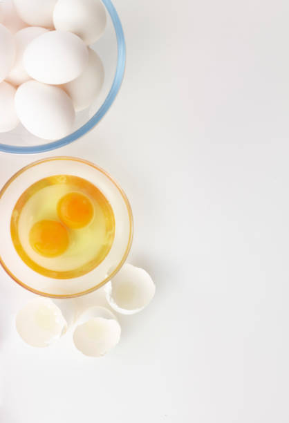 istock eggs, whisk, flour and rolling pin in the white background 1185440501