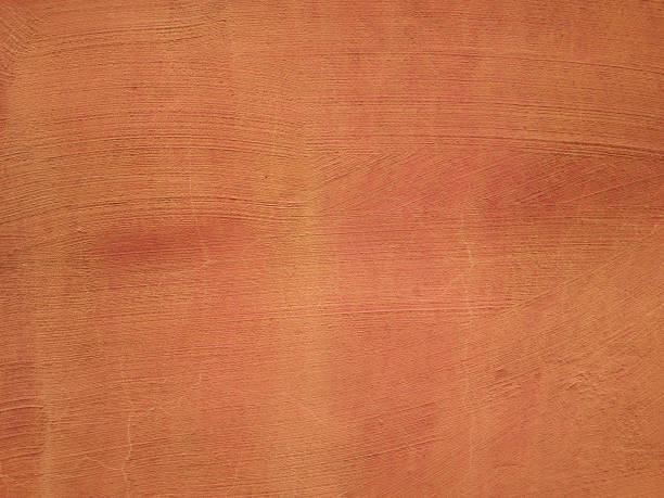 istock Concrete wall of peach color. 1185441641