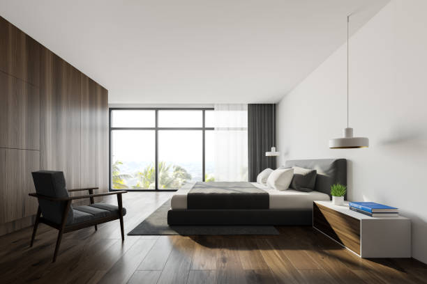 istock White and wooden king size bedroom, side view 1185444152