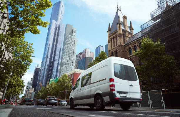 delivery white van in the city - office building car industrial district business imagens e fotografias de stock