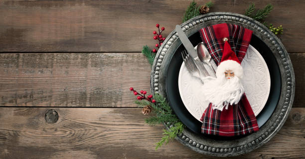 Christmas Dining Plate and Napkin on an Old Wood Table