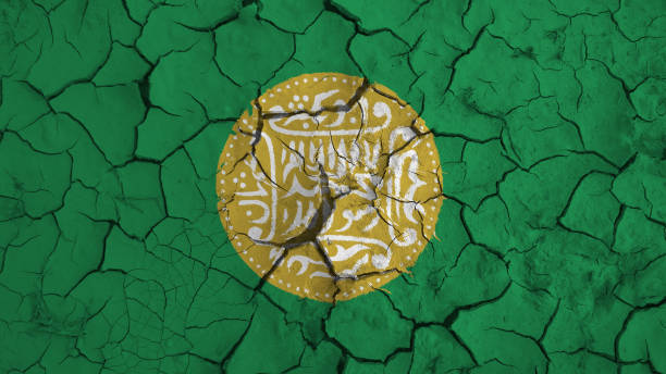 istock Rohingya flag on dry earth ground texture background 1185447928