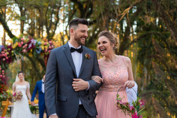 istock Groomsman and bridesmaid leaving at wedding ceremony 1185448298