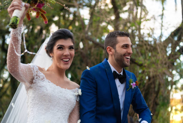 istock Confetti throwing on happy newlywed couple 1185448996