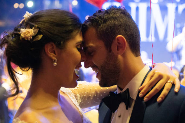 istock Bride and groom dancing during their wedding party 1185449567