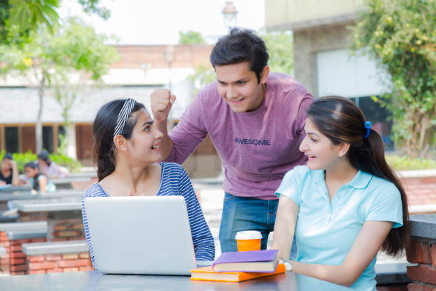istock Excited student on line in a University stock photo 1185449972