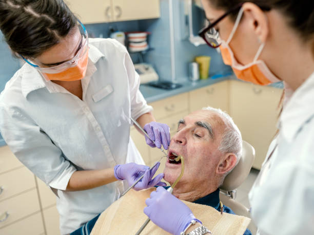 istock Senior man at the dentist 1185451349