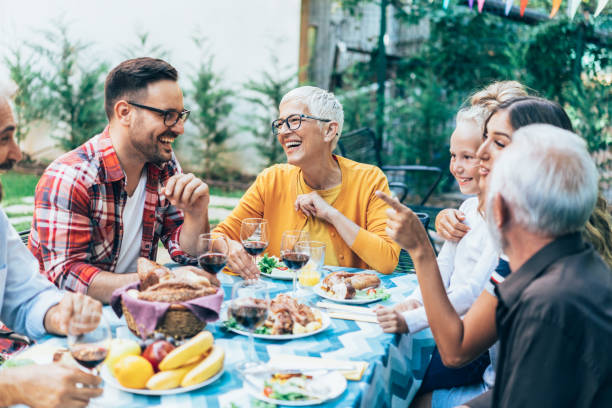 istock Happy family celebrating Thanksgiving day 1185452655