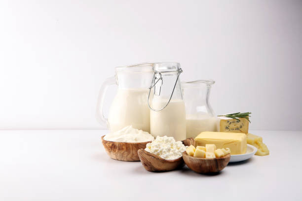 istock Different  healthy dairy products on rustic background with milk, cheese, butter and cottage 1185455837