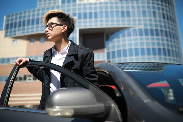 istock Man with car in the street 1185456362
