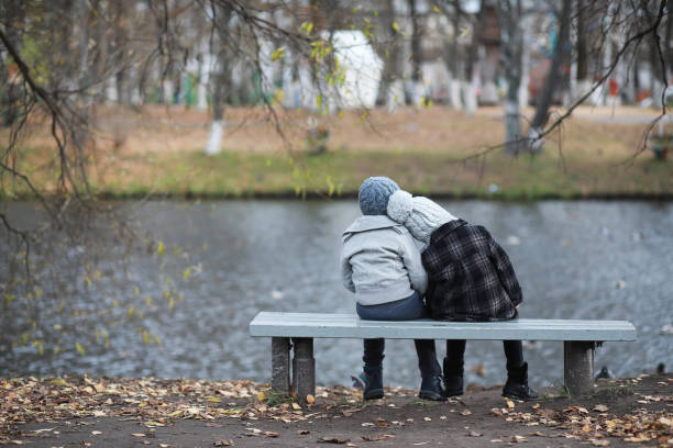 istock Children walk in the autumn park 1185457464