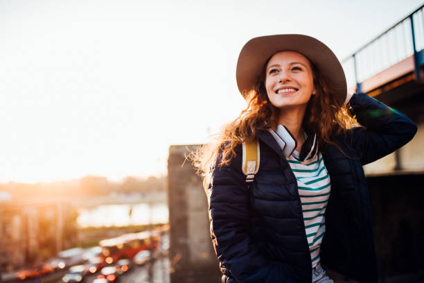 istock Beautiful girl enjoying her vacation 1185460578
