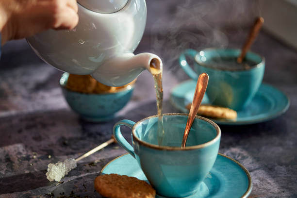 Cup of Black Tea Served with Biscuits