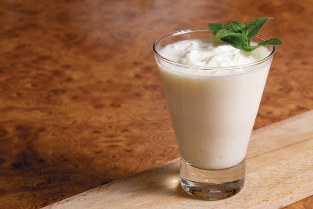 istock Kefir in a glass goblet 1185465522