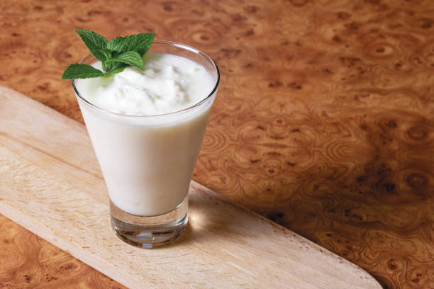 istock Kefir in a glass goblet 1185465524