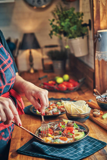 istock Mexican Style Breakfast with Eggs, Mushrooms, Beans, Tomatoes, Avocado and Tortilla 1185465765