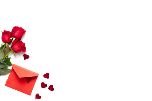istock Red roses and present, composition of Valentines day isolated on white background 1185466845