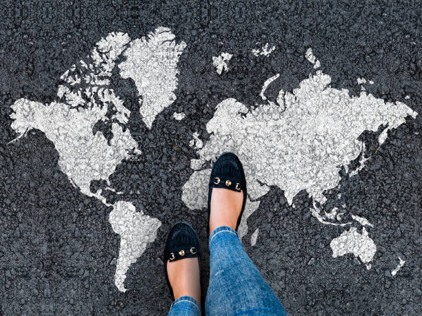 istock world map and womans legs 1185466847