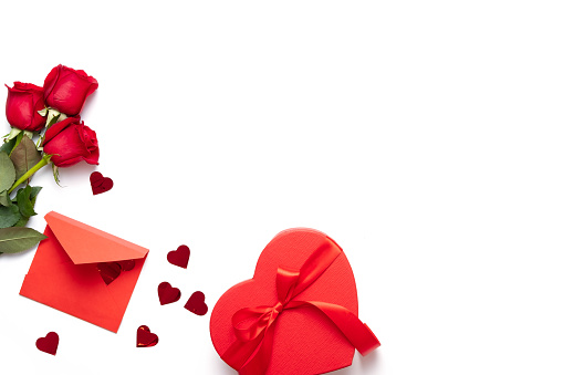 Valentine's day background with heart shape decorations, gift and ribbons. View from above. Flat lay composition