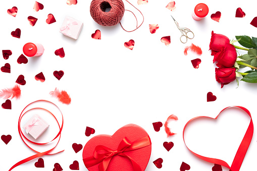Valentine's day background with heart shape decorations, gift and ribbons. View from above. Flat lay composition