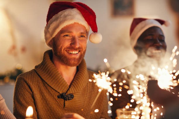 istock Adult Man Enjoying Christmas Celebration 1185468391