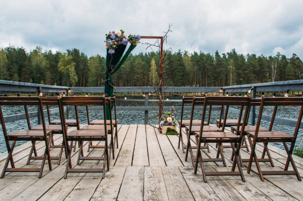 istock Wedding arch decorations on lake 1185469094