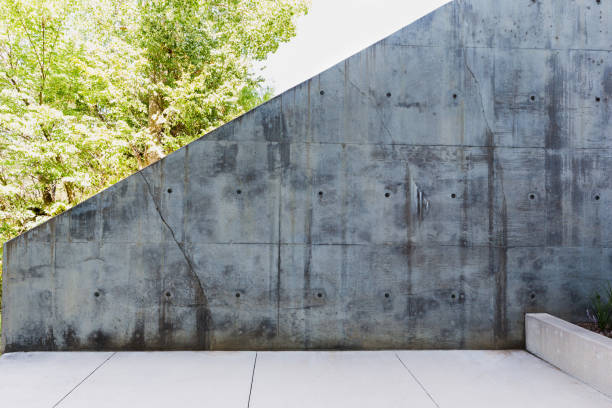 istock Stark contrast between sunny day and cold cement wall 1185470269