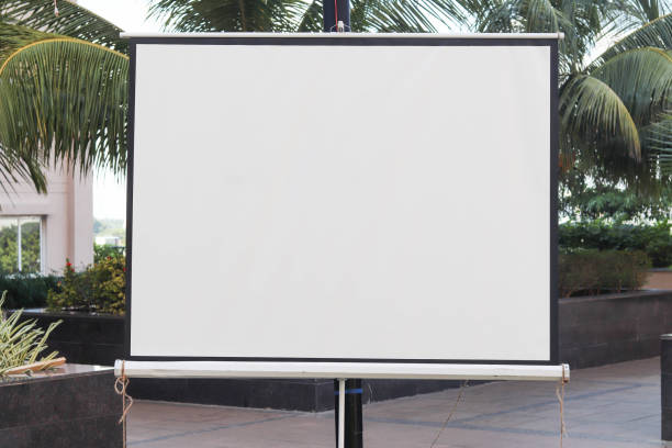 istock Blank White Display Board Projector Screen in Podium Garden Outdoor 1185472033